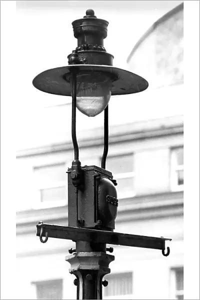 An old fashioned and outdated gas lamp and burner