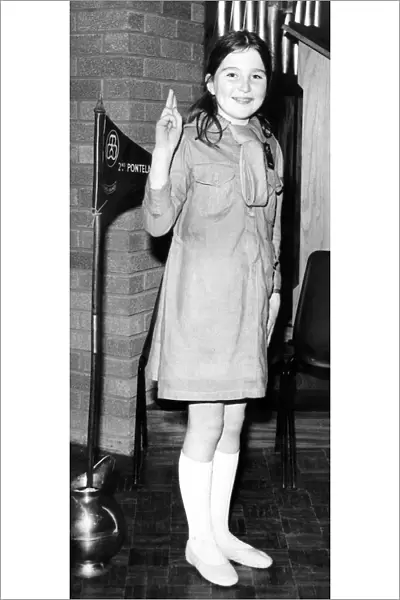 Nine year old Marion Scott in a 1923 Brownie uniform whcih cost £9. 6d