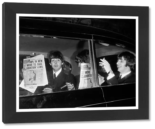 The Beatles leaving The Daily Mirror Golden Ball each with a copy of the paper