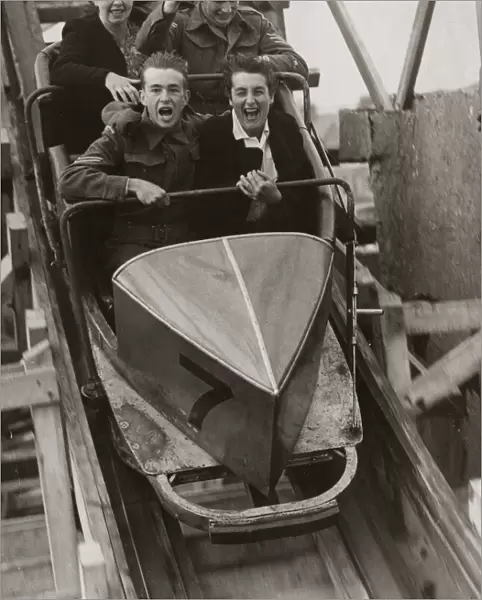 British Soldiers and their girlfriends enjoy a day out at the fun fair