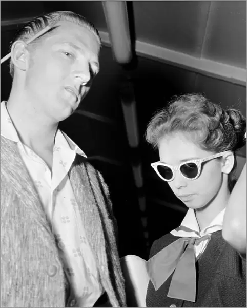 American rock and roll singer Jerry Lee Lewis with his thirteen year old wife Myra at