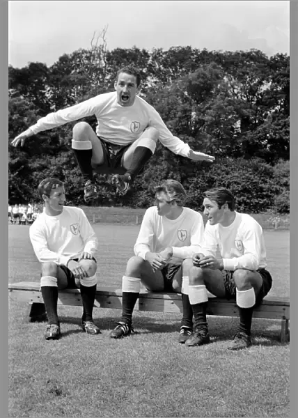 Members of the Tottenham Hotspur team training. Dave Mackay jumping high as