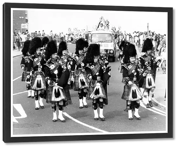 The pipes and drums of the 72 Royal Engineers (V) from Gateshead in a carnival procession
