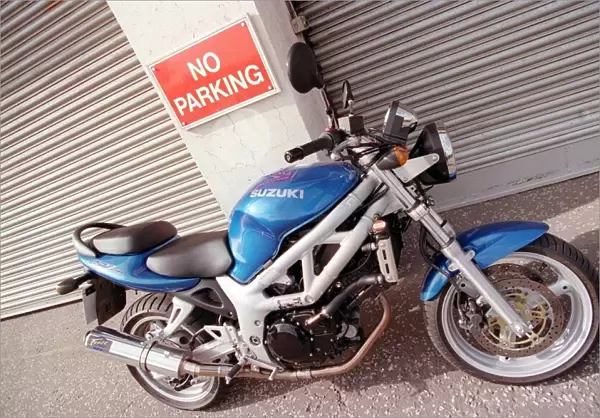 Suzuki SV650 motorcycle Road Record supplement 1999 blue motorbike no
