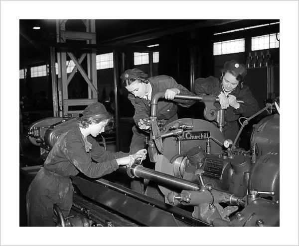 Woman Engineers working a lathe 1941 women doing mens jobs during the war years