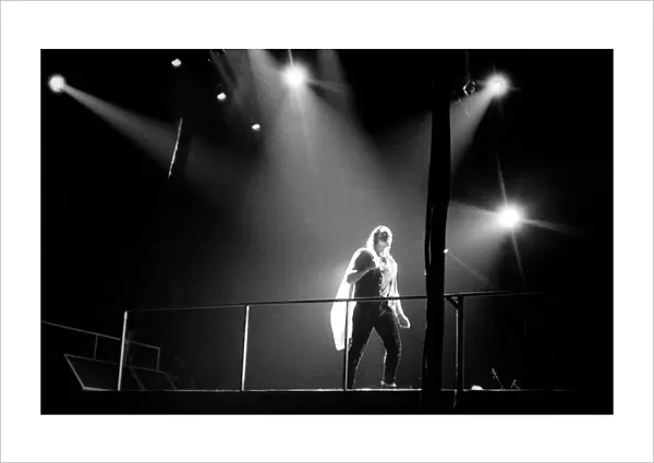 Rock group U2 in concert in USA - May 1987 Bono under the spotlight