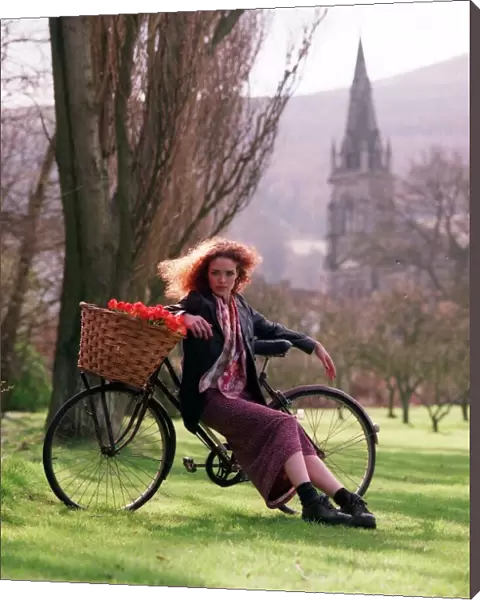 Flower power fashion feature 1998 girl in gardens country side bike basket trees