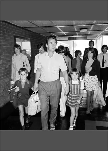Football manager Brian Clough returns from Alicante with his children Nigel