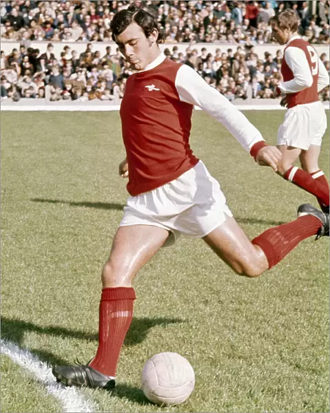 Arsenal footballer Ray Kennedy warms up before the league dvision one match against