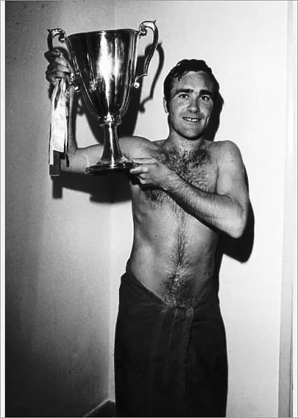 Ron Harris of Chelsea with European Cup Winners Cup trophy after replay in Athens against