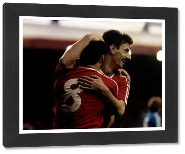 Liverpools Ian Rush and John Aldridge celebrate a goal during a Division One match