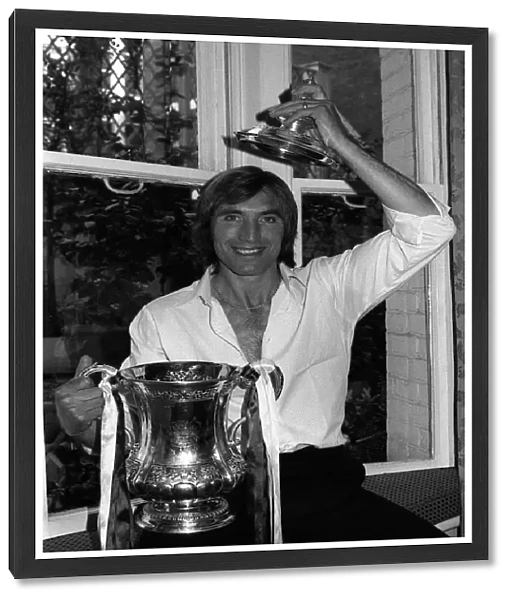 West Ham captain Billy Bonds poses with the FA Cup at the reception at the Town hall