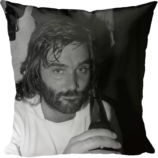 George Best drinking beer after playing Dunstable Town FC August 1974