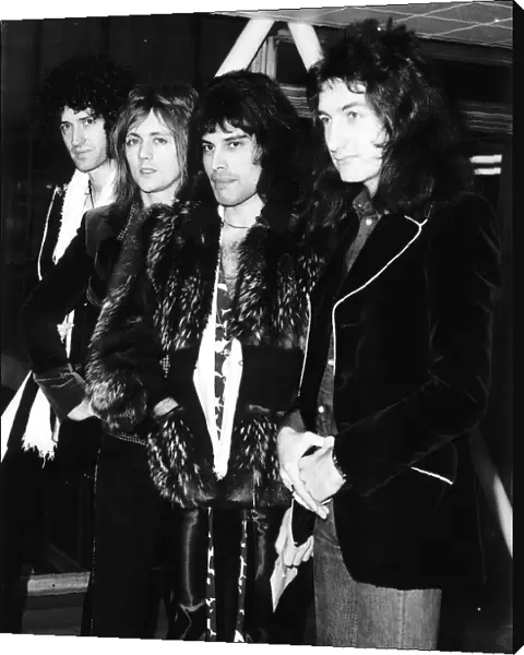 Queen Pop Group From left to right John Deacon Brian May Freddie Mercury
