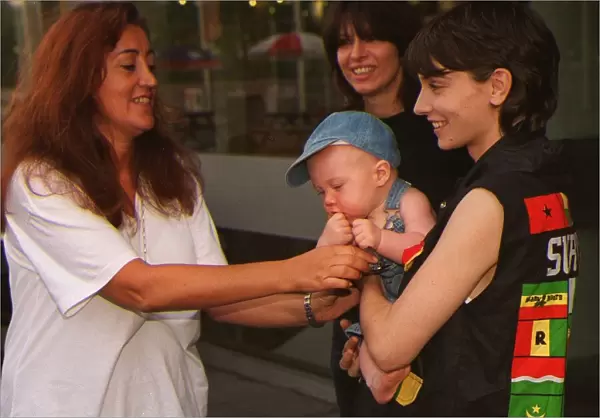Sinead O Connor and Chrissie Hynde with baby Otis and Lynn E Franks who are