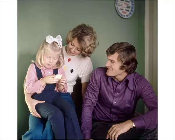 Poland footballer Wlodzimierz Lubanski at home with his wife and daughter