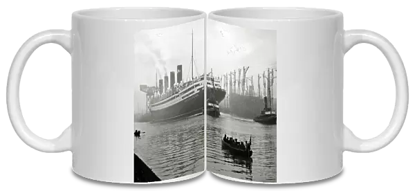 RMS Aquitania seen here being towed away from the John Brown shipyard on the River Clyde