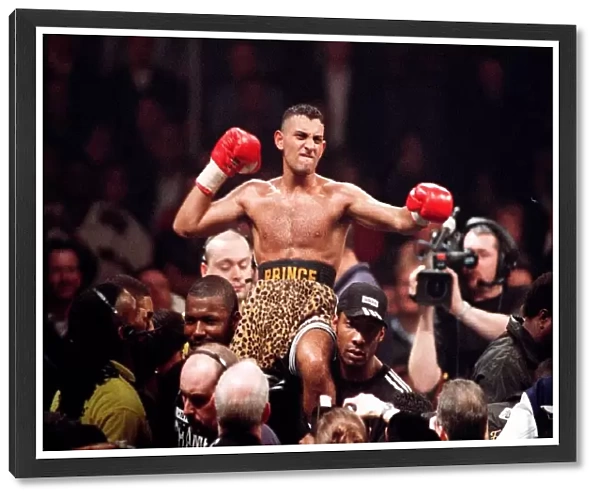 Prince Naseem Hamed on the shoulders of his supporters after beating Tom Boom Boom