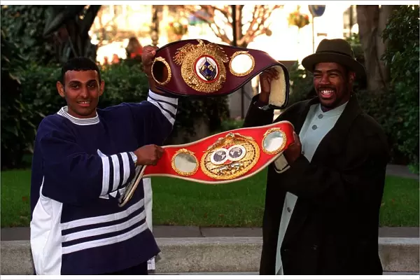 Prince Nasem And Tom Johnson Show Off Their Belts At The Frank Warren Press