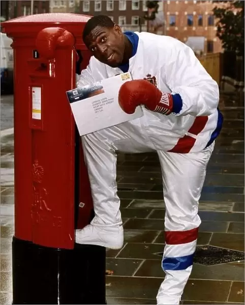 Frank Bruno former Boxer posting a Special Delivery to Lennox Lewis