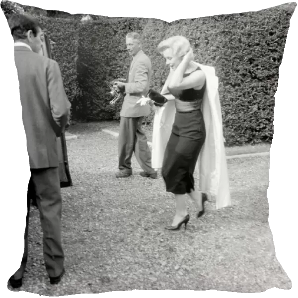 Marilyn Monroe with husband Arthur Miller in Englefield, Surrey. July 1956