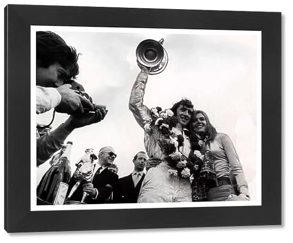 JACKIE STEWART ex World Champion RACING DRIVER WITH WIFE HELEN Stewart AFTER HE WON THE