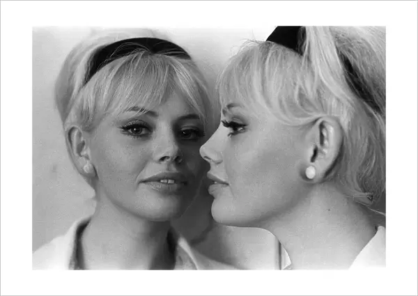 Actress Britt Ekland looking in mirror circa 1960s