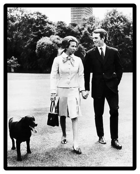 Princess Anne walking with her fiance Mark Phillips after the announcement of