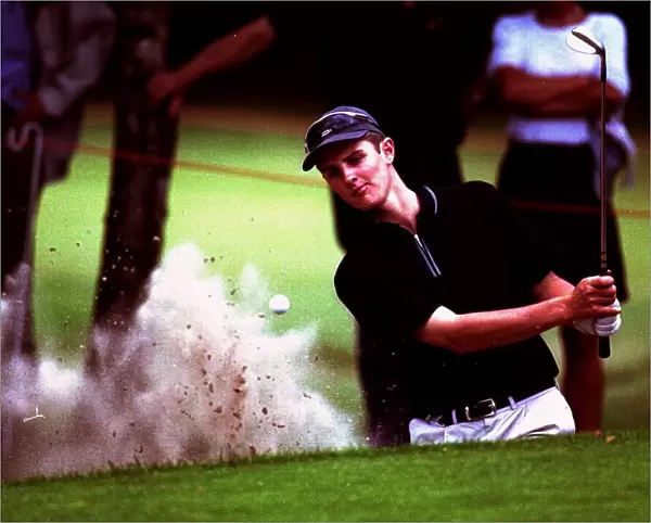 Justin Rose plays out of a greenside bunker on the 15th hole during the Dutch Open Golf