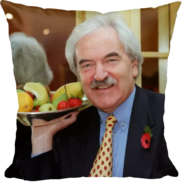 Des Lynam TV Presenter March 98 Holding tray of fruit