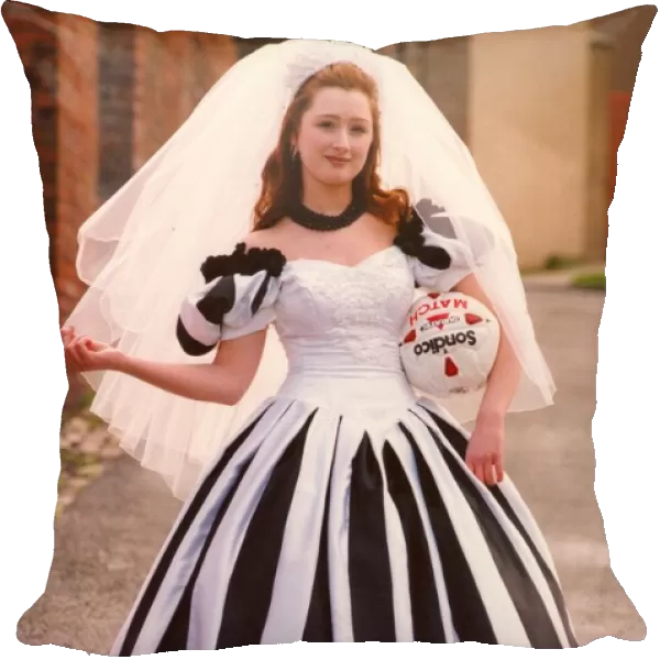 Sarah Robey models the black and white wedding dress which will be on show at an