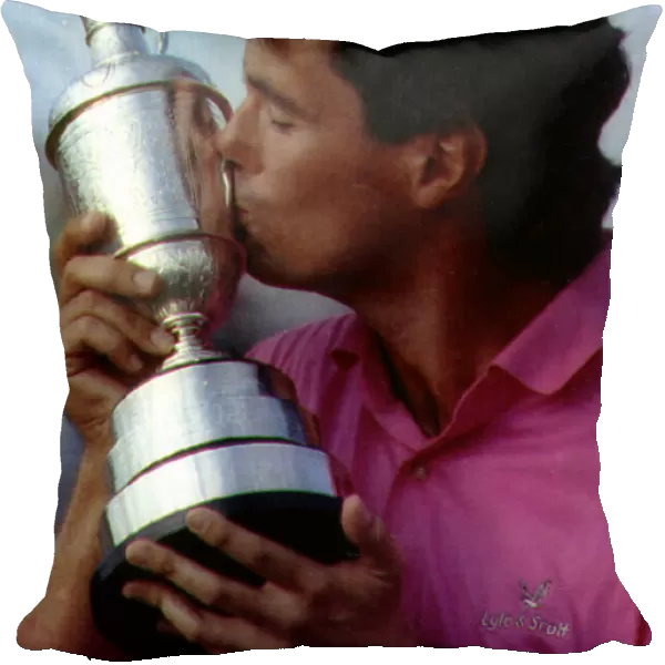 Ian Baker Finch Australian Golfer holding and kissing golf trophy
