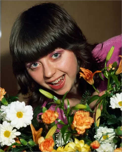 Kirsty Miller Scottish actress with flowers March 1982