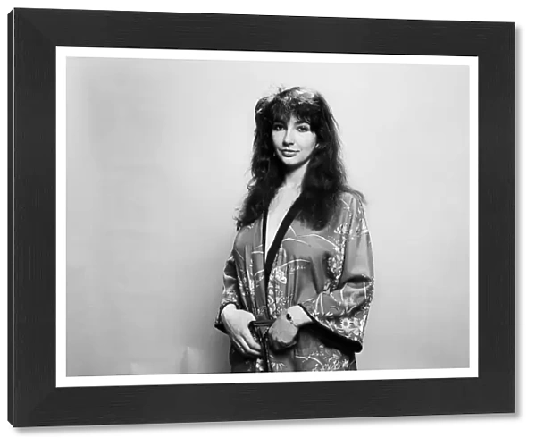 Pop singer Kate Bush poses in the studio wearing a kimono March 1978