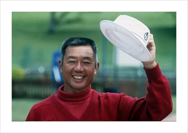 Mr Lu golfer raising hat July 1988