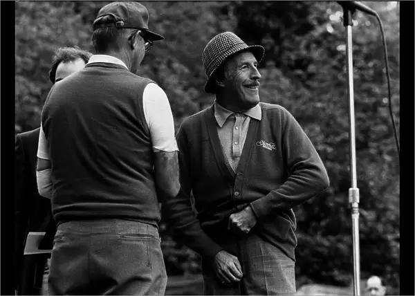 Bruce Forsyth entertainer adjusts his trouser zip at pro celebrity golf day in front of