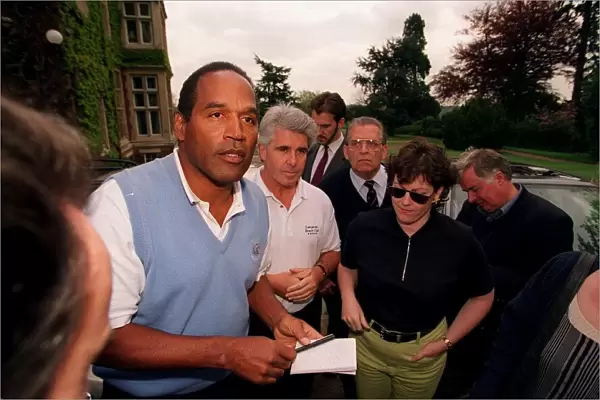 OJ Simpson signs some autographs during his game of golf
