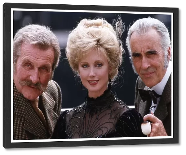 Morgan Fairchild centre with Christopher Lee right who plays the part of Sherlock Holmes