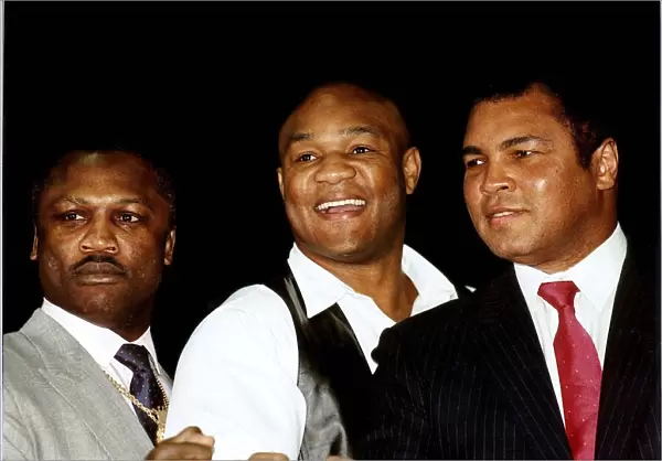 Former heavyweight boxing champion Joe Frazier (left) pictured with George Foreman