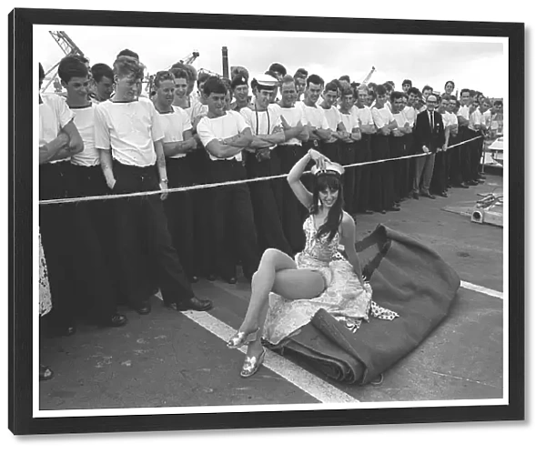 HMS Albion July 1967 One of the girls from the Billy Smarts Circus sits