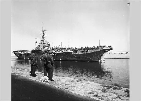 Canal Zone 1952 The Aircraft Carrier HMS Vengence passes through the Suez Canal