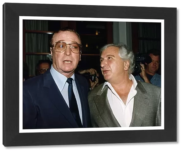 Michael Caine Actor with Film Director Michael Winner at the BAFTA best beginners Awards