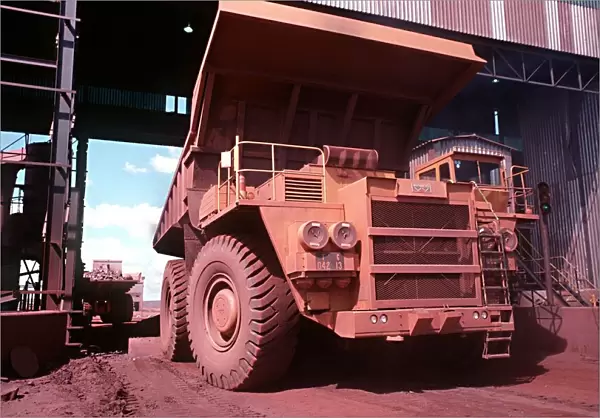 Iron ore truck unloading ore at the primary crusher at Sishen iron ore mine