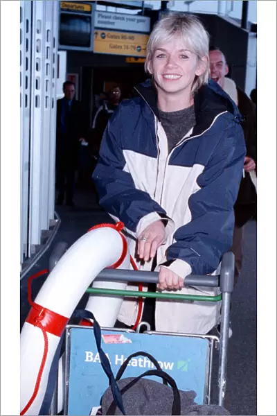Zoe Ball Radio and TV Presenter October 1998 Pushing a trolley as she arrives at
