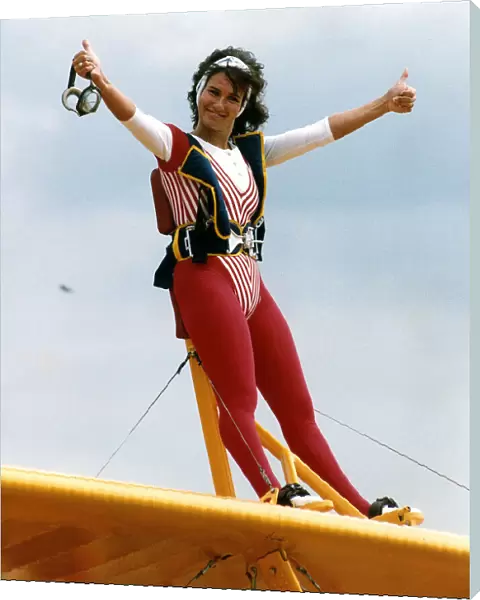Linda Lusardi Model  /  TV Presenter standing on top of a plane May 1990