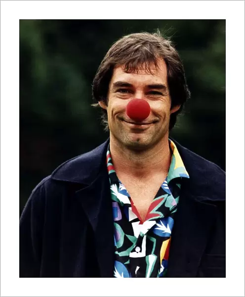 Timothy Dalton Actor wearing a red nose for Comic Relief