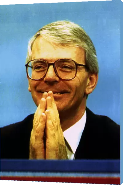 John Major Prime Minister appears to be praying for guidance at the Conservative Party
