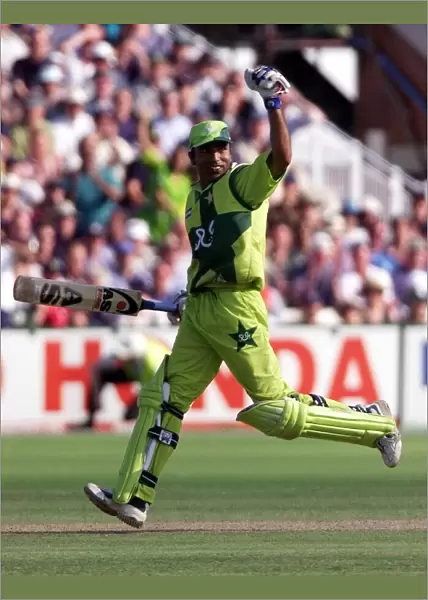 Pakistans Saeed Amwar celebrates his 100 during the Cricket World Cup match