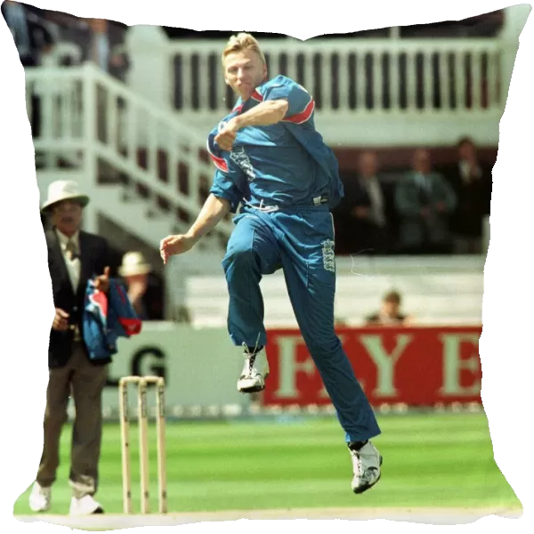 Alan Mullally celebrates taking his second wicket May 1999 for England in their