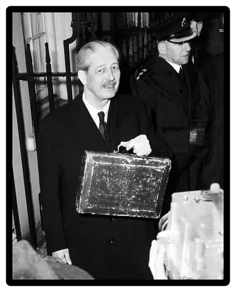 Harold MacMillan Chancellor of the Exchequer leaving Number 11 Downing Street with